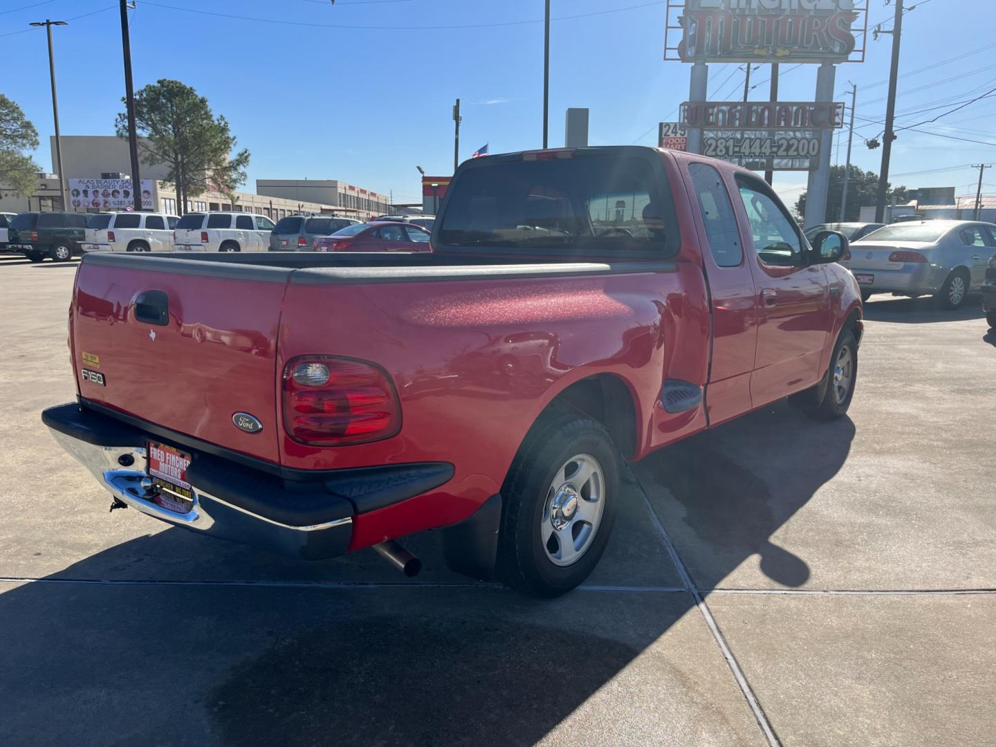 2003 red /TAN Ford F-150 XL SuperCab Flareside 2WD (1FTRX07213K) with an 4.2L V6 OHV 12V engine, Automatic transmission, located at 14700 Tomball Parkway 249, Houston, TX, 77086, (281) 444-2200, 29.928619, -95.504074 - Photo#6